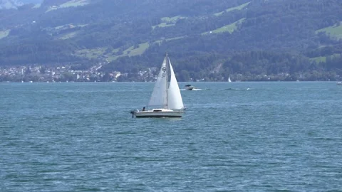 White sailing ship sails pretty fast over the water Stock Footage 206116326