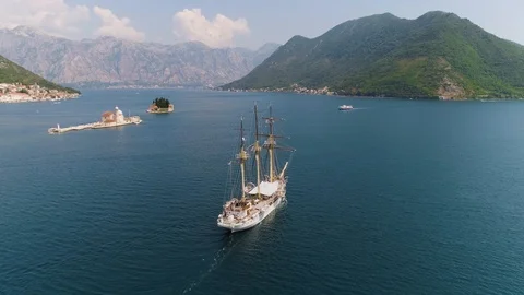 White sailng ship with three mast underway on the Adriatic sea in Montenegro Stock Footage
