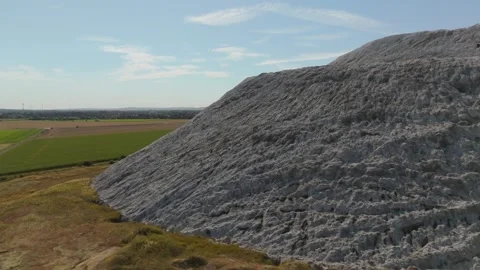 White Salt Mountain Aerial Side View Over Farmland 스톡 동영상 342860901