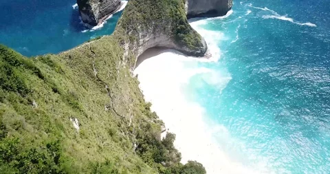 White Sand Beach in Bali Drone Shot through Palm Trees Stock Footage 106788710