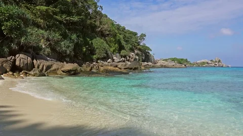 White sand beach between rocks on Similan islands Stock Footage 85380277