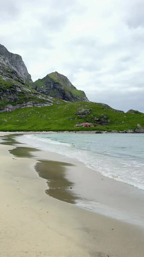 White sand beach of Bunes surrounded by dramatic mountains and turquoise sea Stock Footage 332887241