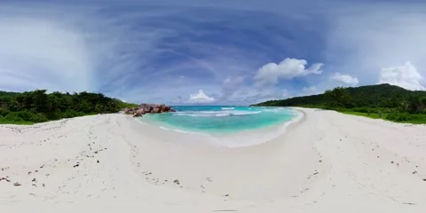 White sand beach with turquoise waves. La Digue, Seychelles. Stock Footage 301286513