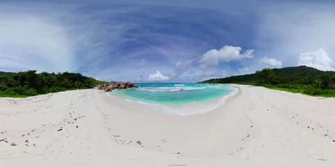 White sand beach with turquoise waves. La Digue, Seychelles. Stock Footage 343335355