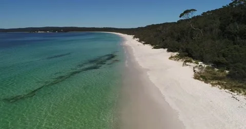 White sand dune beach on Jervis Bay in aerial flying along waterfront in 4k. Stock Footage 139597588