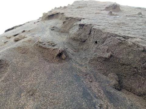 The white sand dune forms like a mountain, something beautiful that deserves to Stock Photos