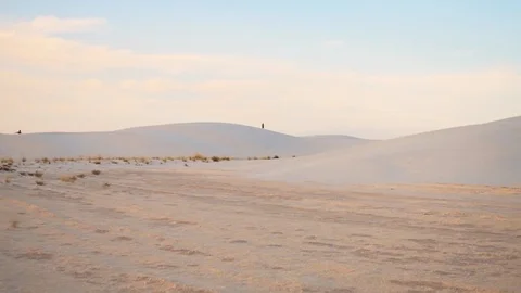 White sand dunes slow motion in New Mexico desert national monument panning Stock Footage 129171572