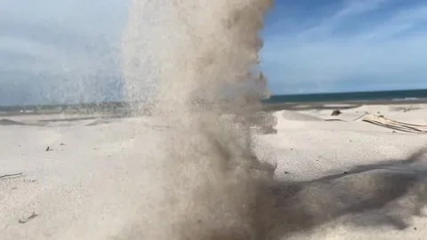 White sand falling from sky on sandy beach sunny day ocean view landscape Stock Footage 252161312