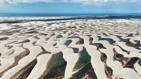 White Sand Ridges and Green Lagoons Across Lençóis Maranhenses Stock Footage 342440853