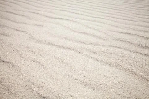 White sand with waves pattern. Background texture Foto stock