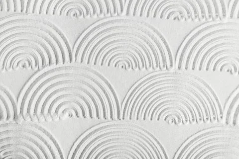 White sand zen garden pattern with concentric arcs, abstract texture backgrou Stock Photos