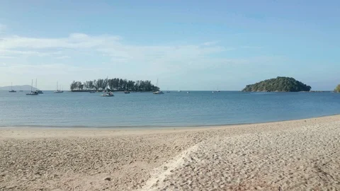 White sandy beach and crystal clear blue water of Pantai Kok, Langkawi island Stock Footage 124480229