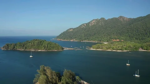 White sandy beach and crystal clear blue water of Pantai Kok, Langkawi island Stock Footage 124480474