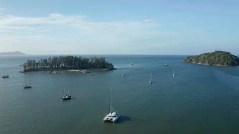 White sandy beach and crystal clear blue water of Pantai Kok, Langkawi island Stock Footage 124481482