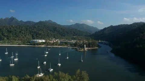 White sandy beach and crystal clear blue water of Pantai Kok, Langkawi island Stock Footage 124482040