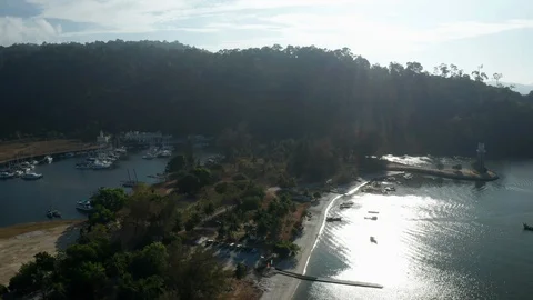 White sandy beach and crystal clear blue water of Pantai Kok, Langkawi island Stock Footage 124484986