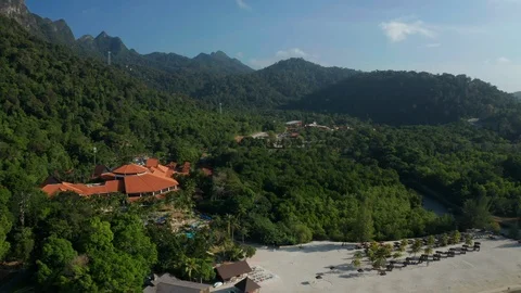 White sandy beach and crystal clear blue water of Pantai Kok, Langkawi island Stock Footage 124486862