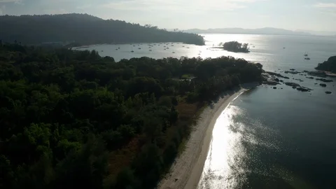 White sandy beach and crystal clear blue water of Pantai Kok, Langkawi island Stock Footage 124506485