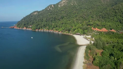 White sandy beach and crystal clear blue water of Pantai Kok, Langkawi island Stock Footage 124506688