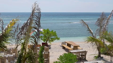 White sandy beach clear blue sea paradise island palm trees Gili Meno Stock-Footage 83693743