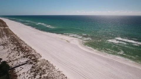White Sandy Beach with emerald colored ocean Stock Footage 68740846