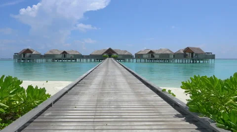 White sandy beach in front of exotic water villa in Maldives Stock Footage 48251848