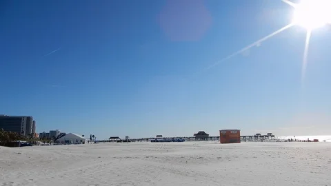 White Sandy Beach Left To Right Panorama With Sun Bokeh In Clear Blue Sky 動画素材 127186157