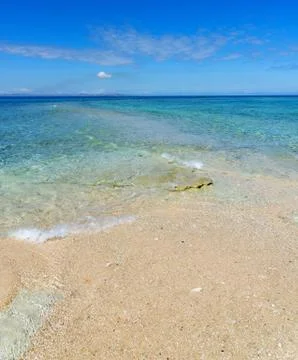 White sandy beach on a small Pacific Island Stock Photos