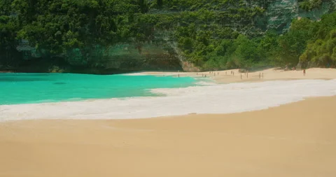 White sandy Kelingking Beach with limestone cliffs on Nusa Penida island Bali Video stock 343374635
