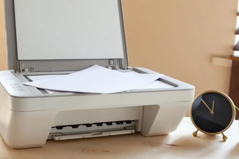 White scanner or printer machine on a table close up Stock Photos