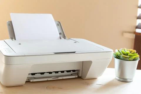 White scanner or printer machine on a table close up Stock Photos
