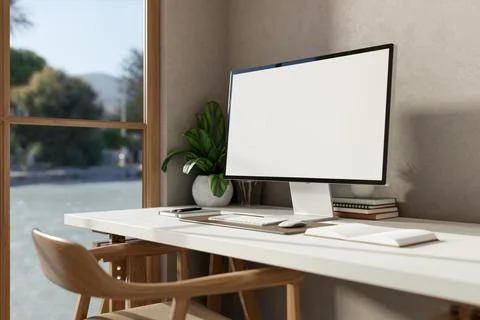 White screen computer and books on wooden table with armchair near glass wa.. イラスト素材