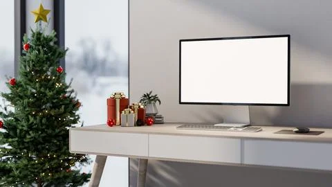 White screen computer and gift box presents on table aside Christmas pine t.. Stock-Illustration