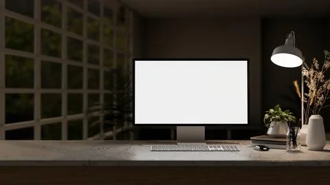 White screen computer aside books and potted plant on marble table under la.. Stock Illustration