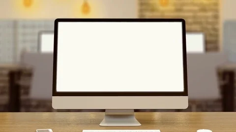 White screen on a computer, blurred background and brightly lit office 4k, ultra Stock Footage 81563038