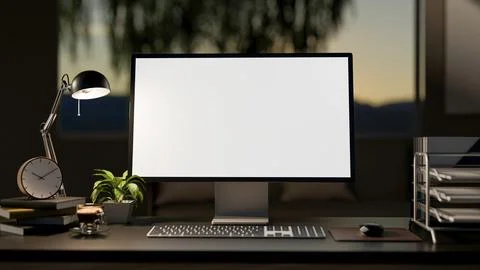 White screen computer with book and coffee on table under lamp light. Study.. Stock Illustration