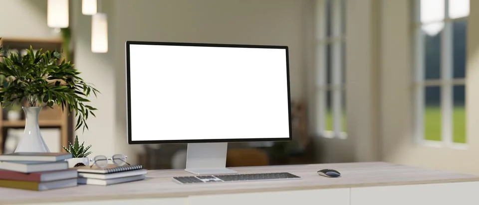 White screen computer with glasses atop books on wooden table in a bright b.. Stock Illustration
