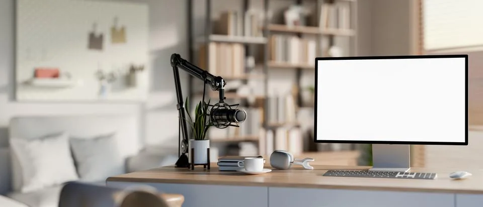 White screen computer with podcast mic and headphone on wooden table in a l.. Stock Illustration