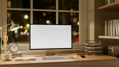 A White screen computer on the wooden table with decorative items, Workspac.. Stock Photos