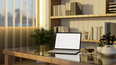 White screen laptop and coffee on glass top wooden table in a living room w.. Stock Illustration
