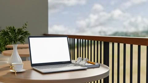 White screen laptop and coffee cup with eyeglasses over book on round woode.. Ilustração Stock