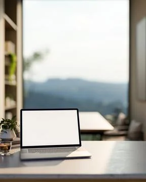 White screen laptop aside pot plant and coffee on marble table across windo.. 库存插图