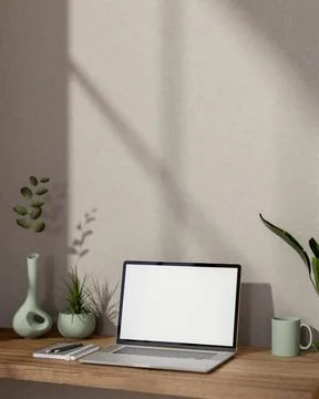 White screen laptop with book and coffee mug aside green plant on wooden ta.. 스톡 일러스트