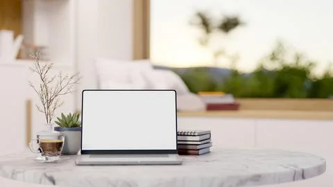 White screen laptop with coffee and book on round marble table across windo.. 库存插图