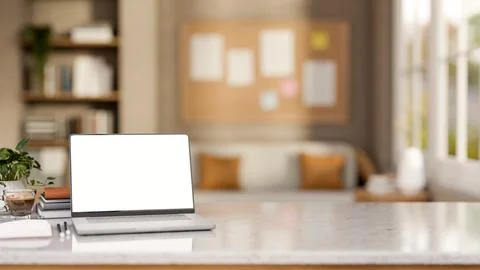 White screen laptop with coffee cup aside books and plant on marble table i.. 스톡 일러스트