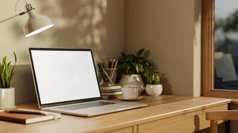 White screen laptop with coffee cup and book under lamp on wooden table asi.. Stock Illustration