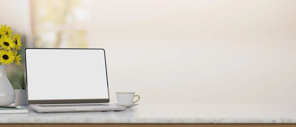 White screen laptop with coffee tea cup and sunflower vase on marble counte.. Stock Illustration
