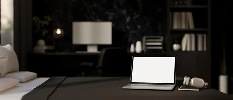 A white-screen laptop computer, a book, and a headphone on a bed in a moder.. Stock Illustration