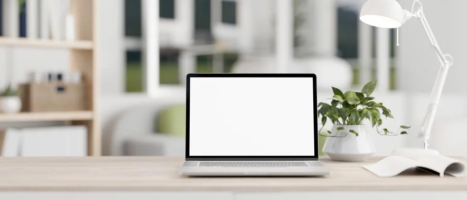 A white-screen laptop computer mockup on a wooden desk in a modern bright l.. Stock Illustration
