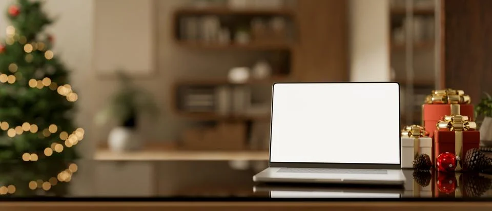 White screen laptop with present gift box on glass table in blurred living .. イラスト素材